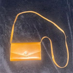 light brown crossover timberland bag/ hand bag